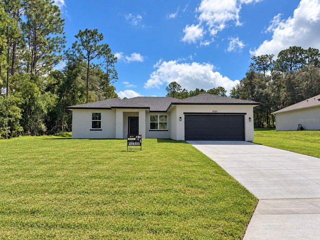 Photo of 8203 N Triana Drive, Citrus Springs, FL 34434 (MLS # O6443310)