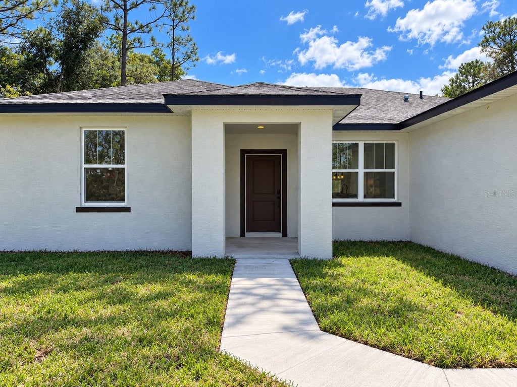 Photo of 8203 N Triana Drive, Citrus Springs, FL 34434 (MLS # O6443310)