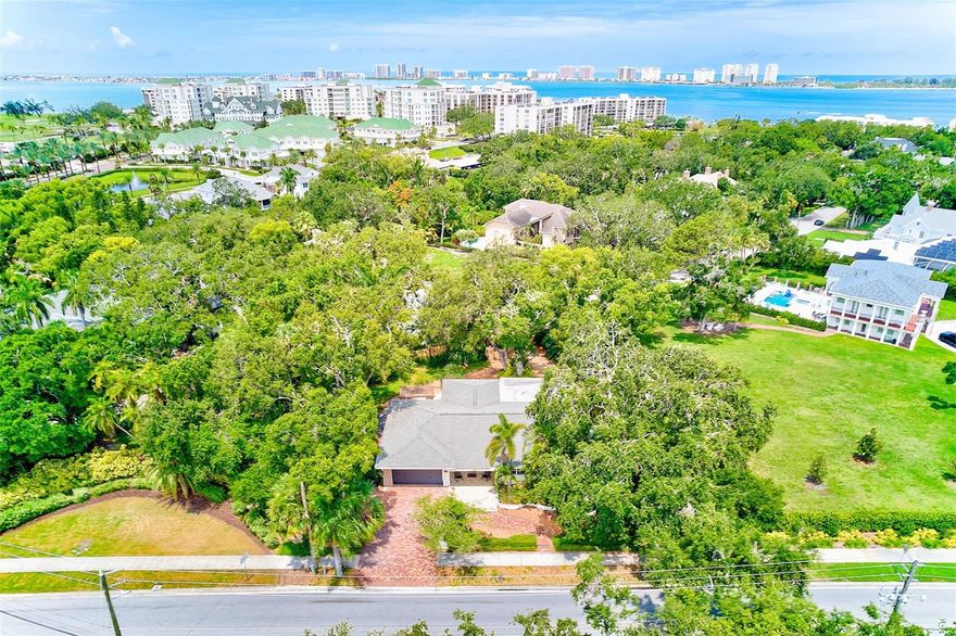 Welcome to your dream home in an unbeatable prime Belleair location, just steps from the exclusive Belleair Country Club, the historic Belleview Inn, and Clearwater Bay. Nestled on an oversized lot across from hole #17 on the private Belleair Golf Course, this 3 bedroom, 2.5-bathroom residence offers luxury, privacy and resort-style living in one of Florida’s most coveted neighborhoods. Step inside this charming cottage ranch-style home, where modern updates blend seamlessly with timeless character. The open layout welcomes you with warmth and elegance, featuring a combined living room, dining room and great room-perfect for entertaining.
The gourmet galley kitchen with vintage meets modern flair is a chef’s delight, boasting quartz countertops, stainless steel appliances and a stylish modern backsplash. A built-in breakfast nook adds a cozy touch, while shiplap and brick accents throughout the home create a one-of-a-kind aesthetic. The spacious primary suite is a true sanctuary, complete with a massive walk-in closet and a serene spa-like bathroom. An attached office features a custom picture window overlooking a lush garden-ideal for a peaceful workspace. Step outside to your private tropical paradise, complete with newly paved patio and pergola that invites relaxation. The Chicago brick driveway and a covered front porch add to the home’s irresistible curb appeal. Additional highlights include a brand-new high efficiency A/C (installed 7/2025) and a private rear entrance framed by a block wall, offering both convenience and enhanced privacy. This home is high and dry-not located in a flood zone or evacuation area! Built for peace of mind, it’s hardwired for a generator and has a proven track record of maintaining power even during storm season!