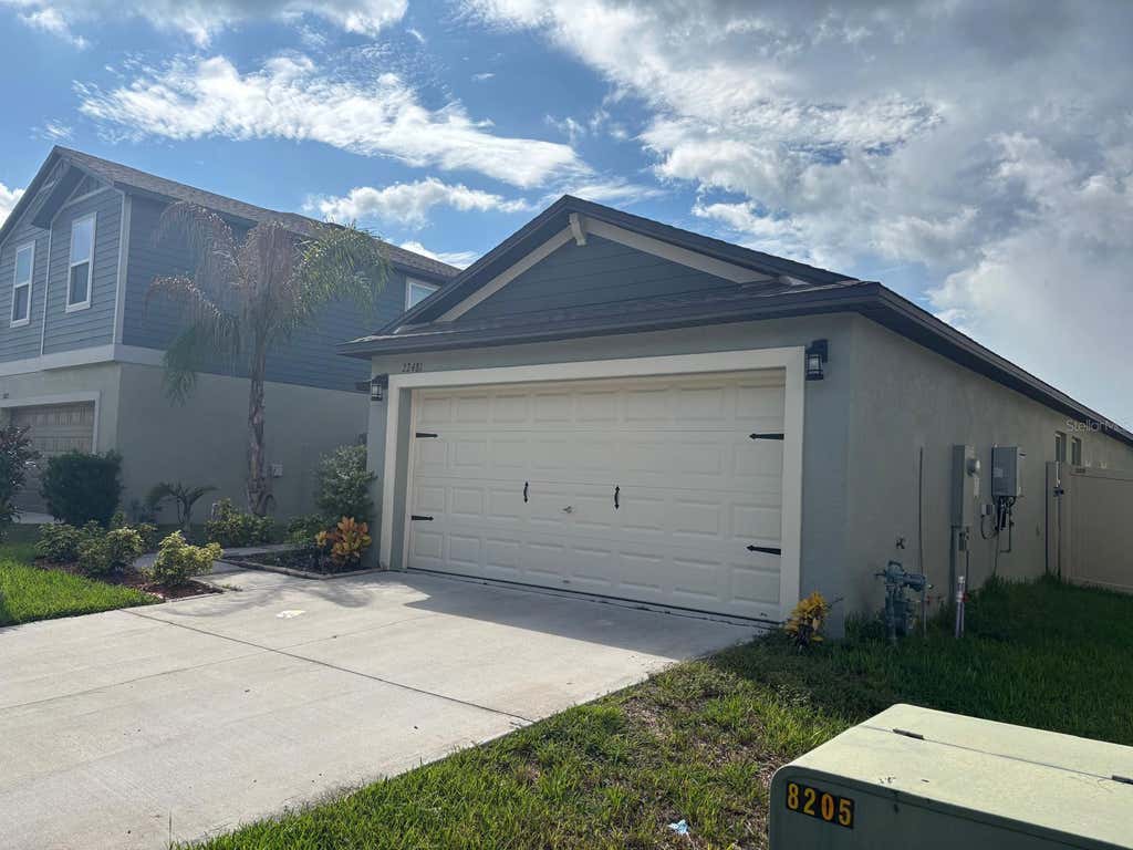 Photo of 22481 Storybook Cabin Way, Land O Lakes, FL 34637 (MLS # TB8542508)