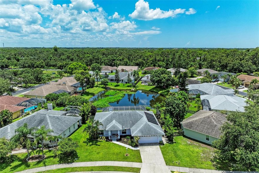 Welcome to 2403 Icecapade Drive — a beautifully renovated 3-bedroom, 2-bathroom, solar heated pool home with peaceful pond views, located in one of Sarasota’s most convenient and vibrant areas. This home blends modern updates with the laid-back Florida lifestyle, offering an open-concept layout with vaulted ceilings and NEW luxury vinyl plank flooring throughout. 

The heart of the home is the fully remodeled kitchen, featuring a fully remodeled kitchen with quartz countertops, NEW stainless steel appliances, and a fresh, modern design that makes cooking and entertaining a breeze. All new impact glass windows and sliders (2021) fill the home with natural light while providing storm protection and energy efficiency. The home’s roof is only 8 years old and the home also includes a wood burning fireplace for the Florida winter nights.  Additional upgrades include a new hot water heater (2019) and impact sliding glass doors that lead out to your private screened-in pool area — complete with a solar-heated pool — perfect for enjoying year-round dips and sunsets over the tranquil pond.  

Beyond the home, you’re perfectly situated to enjoy the best of Sarasota living. Just a short drive away are the white sand beaches of Siesta Key, consistently ranked among the top beaches in the world. Explore the cultural charm of downtown Sarasota, home to The Ringling Museum, Marie Selby Botanical Gardens, Van Wezel Performing Arts Hall, and a thriving art and theater scene.

Shopping enthusiasts will love the proximity to University Town Center (UTC), offering upscale retailers, dining, and entertainment. Nature lovers and active lifestyles will appreciate nearby parks and trails like Nathan Benderson Park, Myakka River State Park, and the Legacy Trail — perfect for biking, walking, or kayaking.

With top-rated schools, nearby golf courses, weekly farmers markets, and endless dining options ranging from casual waterfront eateries to fine dining, Sarasota offers a lifestyle that’s hard to beat.

Whether you're looking for your forever home or a Florida getaway, 2403 Icecapade Drive is move-in ready and ideally located to enjoy all that Sarasota has to offer.