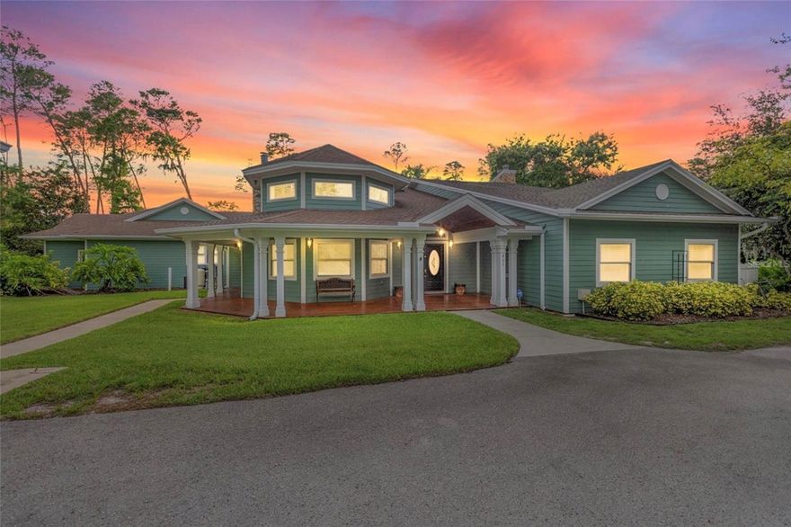 One or more photo(s) has been virtually staged. Welcome to this stunning luxury residence situated on 2.5 private acres in the heart of highly desirable Palm Harbor. Spanning nearly 6,000 square feet, this estate offers 6 bedrooms, 5.5 bathrooms, 3 flex/office spaces, a 3-car garage, and a beautiful sparkling blue swimming pool.

The home boasts a NEW ROOF (2023) and a brand-new paved circular driveway, combining peace of mind with striking curb appeal. Inside, the all-new gourmet kitchen is a showstopper, featuring luxury appliances including a Wolf oven with induction cooktop, Sub-Zero refrigerator, Bosch dishwasher, wine cooler, granite countertops, and custom wood cabinetry with built-in Rev-A-Shelf organization.

The main floor offers a formal living room with a custom fireplace, a second living area with another fireplace, a spacious primary suite with a massive walk-in closet and attached gym/flex space, plus a guest suite with ensuite bath and two additional oversized flex rooms that can function as bedrooms or offices. A dedicated pool bath and guest half bath complete the main level. Upstairs you’ll find four more bedrooms, two full bathrooms, and a large balcony overlooking the peaceful backyard.

Outdoor amenities include a paver patio surrounding the pool, a basketball court, a batting cage, and RV parking. Additional features include a whole-house central vacuum system, deep well and septic, water softener, and reverse osmosis system for the kitchen sink and ice-maker. The home was fully remodeled and expanded in 2004 to meet Miami-Dade wind code standards—engineering certifications and blueprints are available.

Conveniently located just minutes from shopping, dining, top-rated schools, and world-famous Florida beaches like Honeymoon Island, this is a rare opportunity to own a truly unique and spacious luxury home in one of the area’s most sought-after locations. Call today to schedule your private showing!