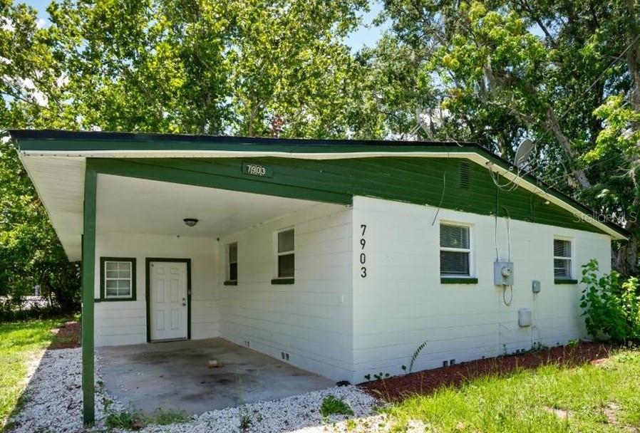 Quaint and spacious home - sitting on nearly a quarter acre, tons of privacy, and already fenced in! Upon entry, you will find the fenced in driveway and carport, adding to the seclusion of this home! Upon entry, you will find the entry foyer, which leads you into the spacious and bright enclosed sunroom. Great space to entertain and enjoy! Past the Sun room is the living room, also open and spacious, and past the living is the separate dining and kitchen area. The kitchen features stainless steel appliances, new cabinets throughout as well as new granite! Past the kitchen, down the hallway is one full bath, and three bedrooms to your right, all spacious - the front bedroom is perfect for an office/work from home space, or play room. At the end of the hallway, you will find the ensuite master bedroom - great space and accommodating, and featuring the ensuite bath! This home has new flooring throughout, fixtures, has been freshly painted in and out, and in an area that is surely growing in equity and price year over year! With the plenty of space outside, it is perfect for the cool nights of fall to entertain family and friends! AC is within 5 years and new roof coming as well! Come see this home today!