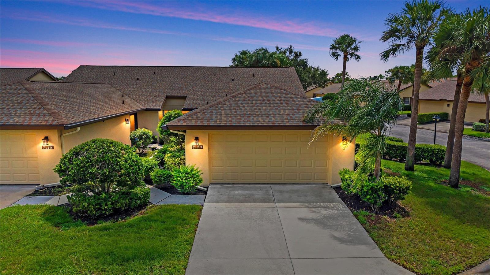 MAINTENANCE FREE LIVING! NEW ROOF! NEW HVAC! This beautiful villa is located in the WoodLake Villas section at Palm Aire, a sought-after Sarasota community. Featuring 3 bedrooms, 2 bathrooms, 2-car garage, and a screened in lanai! Inside the home, is an open floorplan with split bedrooms for extra privacy. The third bedroom has the option to be fully enclosed or to have open, it can be used for an open office, formal dining room, or as flex space to utilize as desired. TILE FLOORING THROUGHOUT! NO CARPET! The kitchen has been remodeled and includes GRANITE COUNTERTOPS, STAINLESS-STEEL APPLIANCES, UPDATED CABINETS WITH SOFT CLOSE DOORS/ DRAWERS, BREAKFAST BAR, AND BREAKFAST NOOK! Next to the kitchen are sliding doors leading to a side porch, perfect for added outdoor seating! The home has VAULTED CEILINGS for a spacious open feel. The Owner's suite has TWO WALK-IN CLOSETS, with an Ensuite bathroom that includes a DOUBLE SINK VANITY, MOSAIC TILE ACCENT, GARDEN TUB, AND SEPARATE WALK-IN SHOWER! GRANITE COUNTERTOPS IN BOTH BATHROOMS! Enjoy Florida living with close proximity to Siesta Key Beach and Anna Maria Island, as well as shopping centers, restaurants, and grocery stores while still being tucked away in a peaceful neighborhood. Come and see everything this home has to offer, call today to schedule a private viewing!