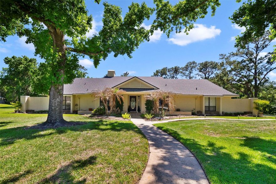 Welcome to 1837 Wingfield Drive, a rare opportunity to own a private ranch-style retreat in the highly sought-after Markham Woods corridor. Perfectly situated on a sprawling 1.5-acre homesite, this property offers an exceptional blend of space, privacy, and natural beauty. The oversized backyard showcases wooded & pond water views, while the neighboring community tennis courts provide an added buffer—creating a uniquely secluded setting where you can relax and enjoy the peaceful sights and sounds of local wildlife. Inside, the home has been thoughtfully updated with modern touches and major system upgrades, including new windows throughout, a high-efficiency 18 SEER HVAC system, and a new water heater—offering both style and peace of mind. The expansive, open-concept family room flows effortlessly into an extended dining area, creating an ideal layout for entertaining and everyday living. A stunning sunroom and solarium feature bring the outdoors in, offering panoramic views of the pool area and tranquil pond beyond. The split floor plan provides both comfort and functionality. The primary suite is generously sized and privately positioned, while two additional bedrooms share a convenient Jack-and-Jill bathroom. On the opposite side of the home, a junior suite with its own full bath offers the perfect setup for guests, multigenerational living, or older children seeking additional privacy. Wood flooring runs throughout the main living spaces, enhancing the home’s warm and inviting feel. Located just minutes from top-rated schools, premier shopping, dining, and only a few blocks from the Seminole Trail, this home delivers the perfect combination of location, lifestyle, and livability. This is a rare chance to enjoy estate-style living in one of Central Florida’s most desirable areas—schedule your private showing today.