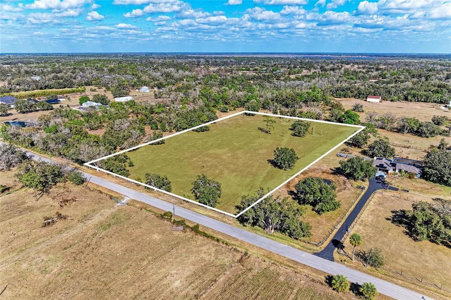 Rarely does an opportunity arise to own nearly five acres of pristine Sarasota landscape in such a coveted location. This exceptional 4.98-acre parcel on Lena Lane offers the perfect balance of rural tranquility and urban convenience, providing a sprawling blank canvas for your architectural vision.

Zoned OUE-1 with open use and agricultural flexibility, this property presents an ideal setting to design and build a custom residence with ample space for a guest home, workshop, barn, or additional estate features. The generous acreage is especially appealing for equestrian enthusiasts, hobby farming, or those simply seeking privacy and room to grow. With no deed restrictions or HOA requirements, owners can enjoy added freedom and flexibility to accommodate farm animals, boat or RV storage, trailers, detached garages, workshops, and other lifestyle amenities tailored to their needs.

Essential utilities add to the parcel’s appeal, with electricity available nearby, while a well and septic system would need to be installed allowing for a more private, self-sufficient setup. Located in a no flood hazard area, the property offers added peace of mind for future development and ownership. 

Despite its peaceful, tucked-away setting along a quiet canopy-lined road, the parcel remains conveniently positioned with easy access to Sarasota, University Town Center shopping and dining, I-75, and the Gulf Coast’s world-renowned beaches.

This is a rare opportunity to secure one of the few remaining large parcels in the 34240 area and create a private estate tailored to your vision and lifestyle.