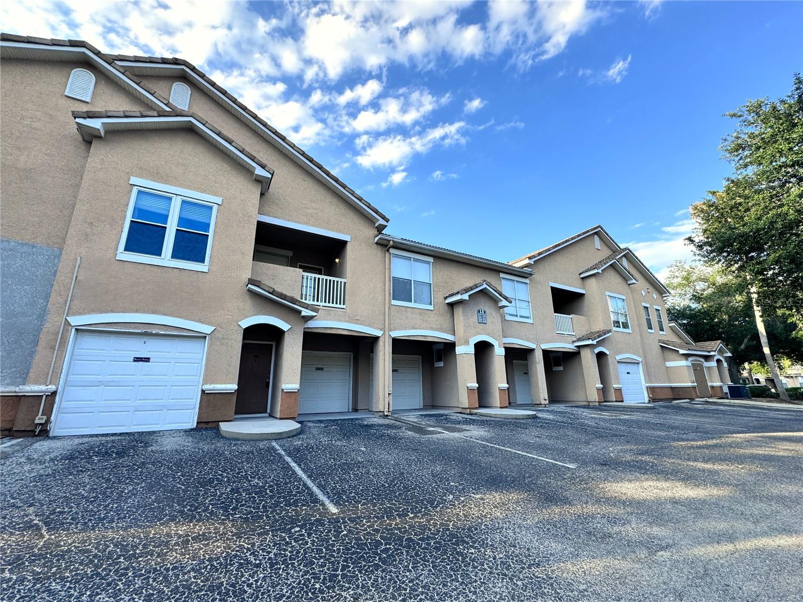 Move-in ready luxury condo on the second floor – the perfect place to call home! Located in the heart of New Tampa within the highly sought-after gated community of The Villas, this beautifully maintained 1-bedroom, 1-bath unit offers a spacious open floor plan with 1,088 sq ft of living space. Featuring stainless steel appliances, a kitchen with wood cabinetry, breakfast bar, and pantry, this home is ideal for both daily living and entertaining. Enjoy tile and laminate flooring throughout – no carpet anywhere! The generous primary suite includes a large walk-in closet and additional storage space. Residents can take advantage of top-notch community amenities including a clubhouse, fitness center, pool, and playground. With easy access to I-75, USF, VA Hospital, Downtown Tampa, parks, golf courses, shopping, dining, and entertainment, this home truly has it all. A must-see that won't last!