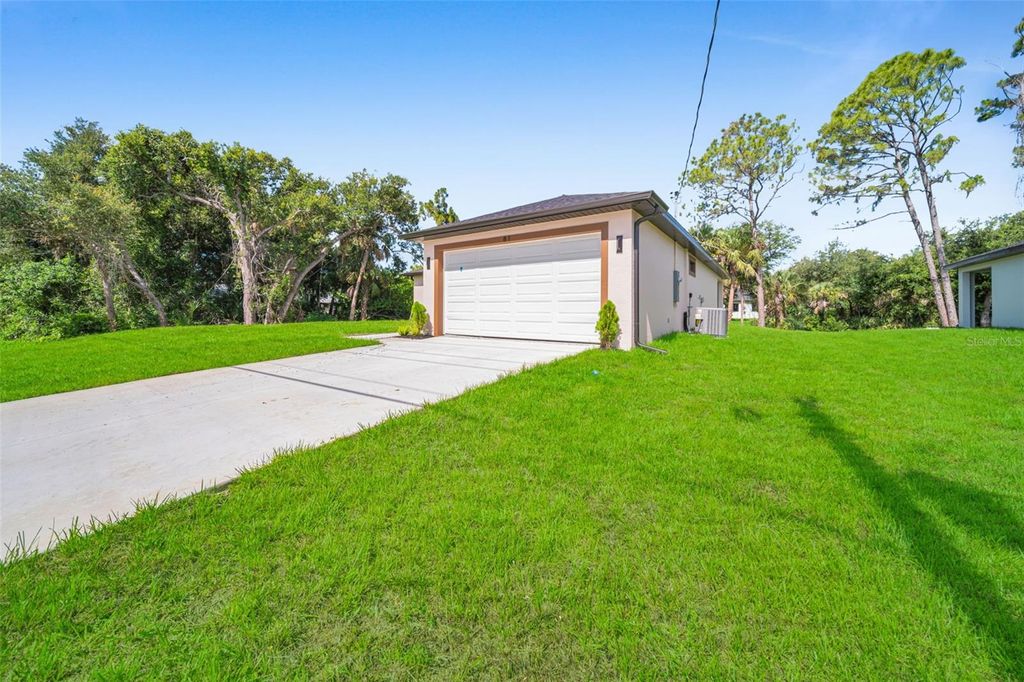 Photo of 81 Flamingo Boulevard, Port Charlotte, FL 33954 (MLS # TB8510243)
