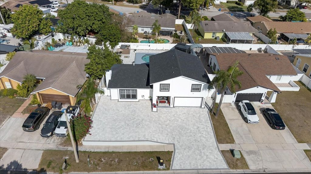 Photo of 7613 Rustic Drive, Tampa, FL 33634 (MLS # TB8454434)