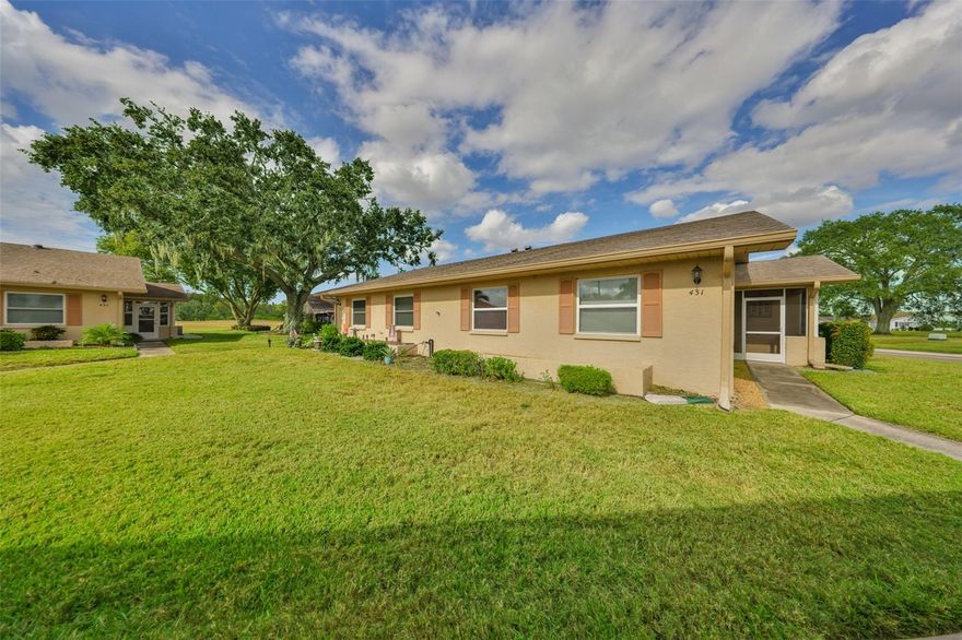 This 2 Bedroom, 2 Bath Condo features a spacious glass-enclosed Lanai with golf cart accessibility — perfect for relaxing or entertaining year-round. Enjoy easy-care laminate flooring throughout the main living areas and tile floors in the bathrooms. The kitchen includes an extra cabinet for added storage, and the convenient laundry room is located just off the Lanai. Two assigned parking spaces provide added convenience. Located in a great neighborhood within the sought-after Kings Point community, offering endless amenities and an active Florida lifestyle! This Condo is ALL INCLUSIVE as the COA fee includes an impressive list of amenities such as 24-hour guard, Cable TV, Internet, Pest Control, the community pools, exterior maintenance to include painting and roof replacement, lawn maintenance, trimming of bushes and trees, all water inside & out, recreational facilities, and sewer. Located just south of Tampa, Kings Point is a resort-style active retirement community. Gated, with two beautiful clubhouses, 6 heated pools, an 850-seat theater, an elegant spa, tennis courts, golf course, hot tubs, saunas, billiards, several pickleball courts, two state-of-the-art fitness centers, and much, much more. Dozens of social and sports clubs will keep you entertained year-round. This maintenance-free community allows access to doctors, hospitals, shopping, banking, restaurants, and virtually everything you will ever need via a golf cart. Kings Point even offers a free transportation system. Centrally located minutes from an assortment of spectacular beaches, world class fishing, Tampa's convenient cruise port, and Disney World, Kings Point is an award-winning community and one of Florida's best places to live!