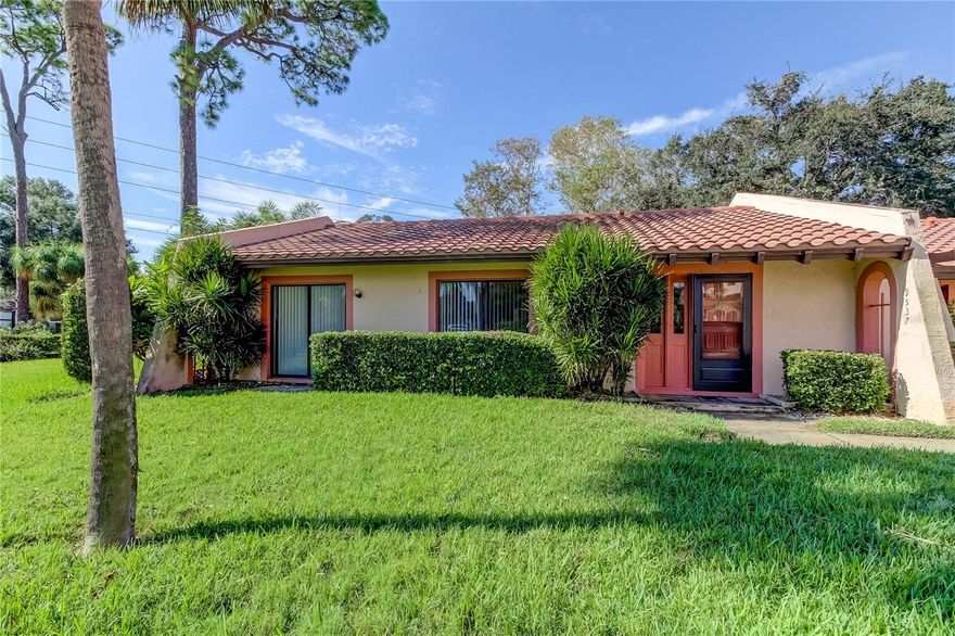 Welcome to your new home, a beautifully maintained 2-bedroom, 2-bathroom oasis that perfectly blends modern convenience with comfortable living. Nestled in a serene neighborhood, this charming residence offers maintenance-free living, allowing you to spend more time on the things you enjoy. As you step inside, you are greeted by gleaming hardwood floors that flow seamlessly throughout the home, adding a touch of elegance and warmth to every room. The expansive living area is bathed in natural light and high vaulted ceilings, providing a welcoming atmosphere for both relaxation and entertaining guests. The kitchen is equipped with newer appliances that are just under two years old, ensuring top-notch performance and energy efficiency. With ample counter space and storage, meal preparation becomes a breeze. Adjacent to the kitchen, a dining area offers the perfect setting for both casual meals and formal gatherings. The two generously sized bedrooms provide a peaceful retreat at the end of the day. Each bedroom is thoughtfully designed to maximize comfort and functionality, with plenty of closet space to meet your storage needs. A bonus Florida room sits directly off the primary suite for quiet relaxing. The primary suite also includes an en-suite bathroom, offering privacy and convenience, while the second bathroom is easily accessible from the main living areas and second bedroom, that features a Murphy bed for extra space. This home has been meticulously updated with a new dishwasher, updated closet doors, plumbing renovations completed in 2022, and a new A/C installed in November 2025, offering you peace of mind and reliability for years to come. Additionally, the entire interior has been freshly painted in a contemporary palette, complementing the home's aesthetic and creating a move-in-ready environment. Outside, a covered carport provides protection for your vehicle from the elements, adding an extra layer of convenience. The low-maintenance exterior means you'll spend less time on upkeep and more time enjoying your lovely home. Overall, this property offers an unparalleled opportunity for comfortable living in a quiet sought-after area, that includes cable, internet, water, trash, roof and exterior maintenance. With its prime location and exceptional amenities, this home is ready for you to make it your own. Seller will include 6 months of paid HOA fees at closing.