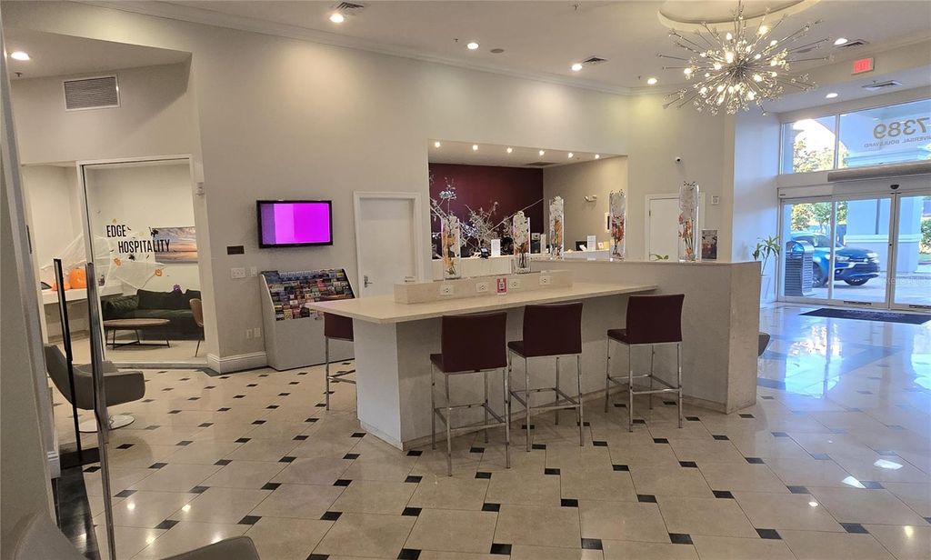 Photo of 7383 Universal Boulevard #410, Orlando, FL 32819 (MLS # O6355137)