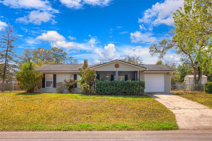 Spacious 3/1 home in Lake Helen. This 1,179 sq ft ranch sits on a generous .24-acre lot with mature landscaping and a fenced yard. Features include an attached 1-car garage, open living/dining combo with ceiling fans throughout, walk-in closets in all three bedrooms, and a large laundry room (7x12) with extra storage. Central heat/air, tile flooring in main living areas, carpet in bedrooms, and septic system. Conveniently located in historic Lake Helen—"The Gem of Florida"—known for its small-town charm, tree-lined streets, and rich history. Just minutes from downtown DeLand's shops and restaurants, Stetson University. Easy access to I-4 for quick trips to Orlando (35 miles), Daytona Beach (24 miles), and Blue Spring State Park. Great schools: Volusia Pines Elementary, DeLand Middle, and DeLand High. Perfect for families, first-time buyers, or investors seeking affordable living in a peaceful setting! Sold as-is. Call today for your private showing! **MLS info is intended to be correct but is not guaranteed. All information must be verified by buyers.**