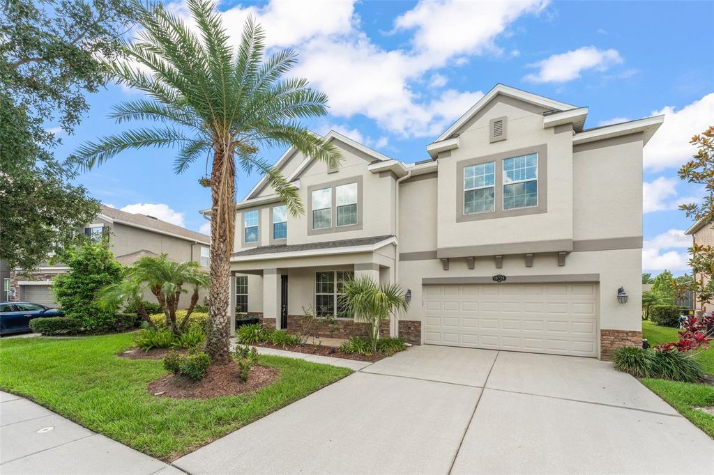 Photo of 10720 Breaking Rocks Drive, Tampa, FL 33647 (MLS # O6320205)