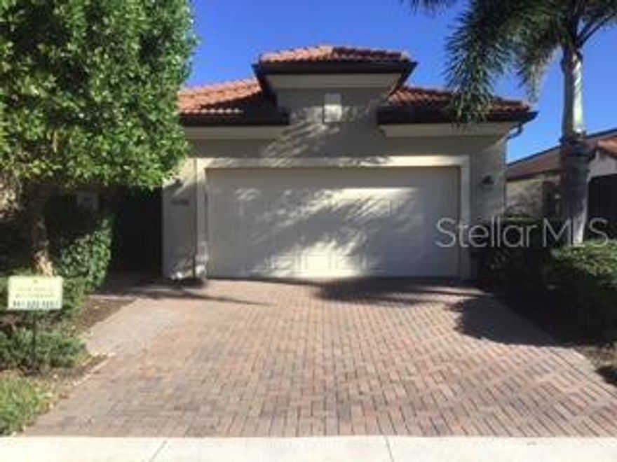 Come see this Charming 8 year old single family home located in an active resort style community.  Abundant light in this spacious open floor plan with an expansive preserve/waterfront view.  This home offers 2 Bedrooms, 2 Baths, a Flexroom/Den, and full Dining-room, stainless steel appliances, luxury vinyl master bedroom flooring, diagonal tile flooring throughout.  The Upgraded 30' extended lanai and the screened front porch add even more tranquil space to this already open floor plan. The $60k added value upgrades include Hurricane Accordion Shutters, Impact glass designer front door, the 30' Extended Lanai with new screens and premium pavers, 220v dedicated electric to the Hot Springs Spa hot tub, luxury vinyl master bedroom flooring, expanded driveway, gutters and baffles, an added kitchen pantry, beautiful glass backsplash, garage storage racks, attic stairway with attic flooring, dedicated electric outlet in garage, upgraded ceiling fans, timers, and several smart home features.  The master suite has 2 walk-in closets and en-suite bathroom with double sinks.  What you will love about this home is the location - nestled in Sarasota National, has an Audubon International Certified Signature Sanctuary Golf Course in this gated community with 1,300 acres of preserves and lakes. From this waterfront view, you will witness bird migrations, eagles, osprey, turtles, hawks, alligators, otters, sandhill cranes, bobcats, panthers and much more!   If you are looking for amenities, look no further as Sarasota National offers resort style living!  Exercise at the fitness center or lap pool, play pickleball, bocce or tennis, swim in the resort pool, relax in the hot tub and relax under an umbrella, participate with others in the game rooms, dine and drink at the tiki-bar, outdoor or indoor full-service dining room during themed nights such as Prime-Rib night. The dog park has recently been upgraded, there’s a playground for the family, an event lawn, organized weekly themed events, music nights, trivia, bingo, and year-round fun, all ready to fill your leisure time.  The coffee lounge is another place to relax and grab a book.  The Hurricane accordion shutters and a beautiful hurricane impact front door will ease your mind of any worries - 15 minutes and ready!  This Estate home is also maintenance grounds free - no worries about irrigation timers, hedges and trees to be trimmed, mulch placed in the gardens, mowing, lawn treatments…. you can be away a week or months without stressing about your home - a well-deserved carefree lifestyle!  Basic cable is included too!   The granite counter kitchen offers plenty of space offering a larger working kitchen area with the new pantry added.  The light and airy open space floor plan makes it comfortable to entertain both inside and out.  Very few homes are currently for sale in this lower HOA community that does not require any golf resort fees.  Conveniently located near Wellen Park and beaches.