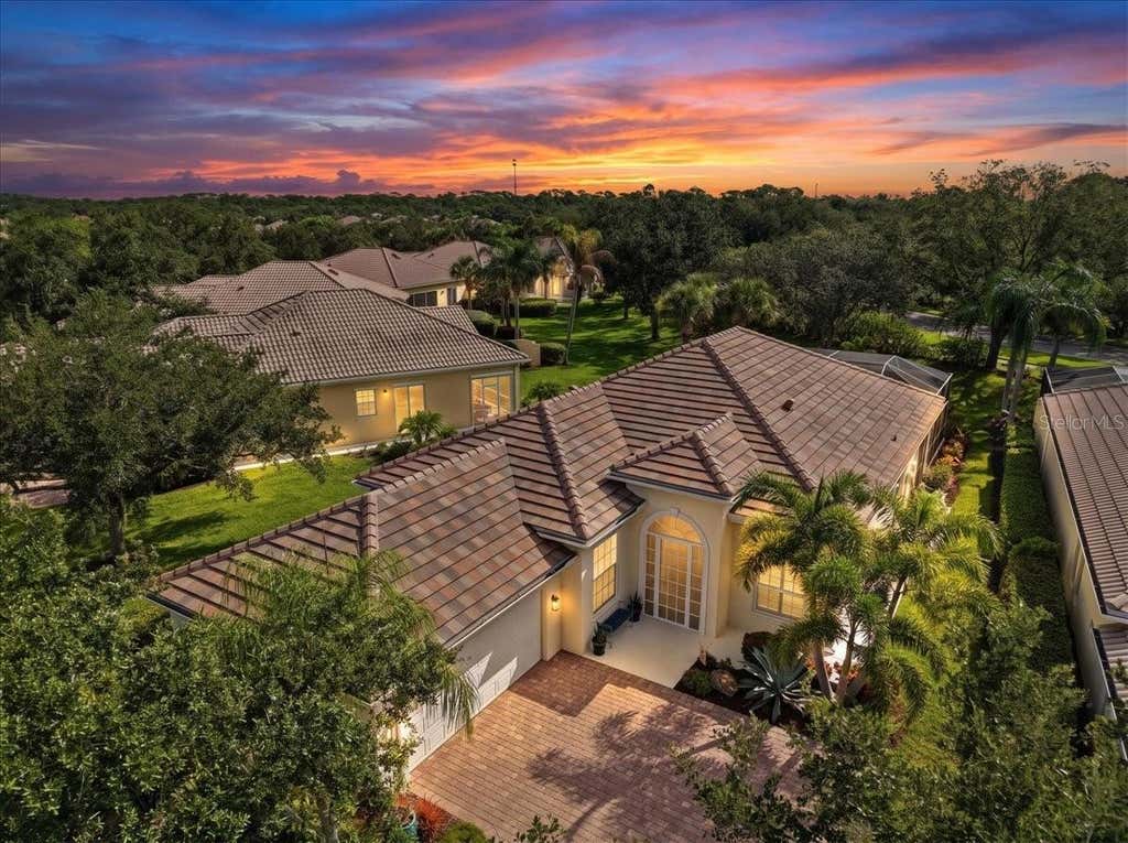 Photo of 5735 Ferrara Drive, Sarasota, FL 34238 (MLS # A4703217)