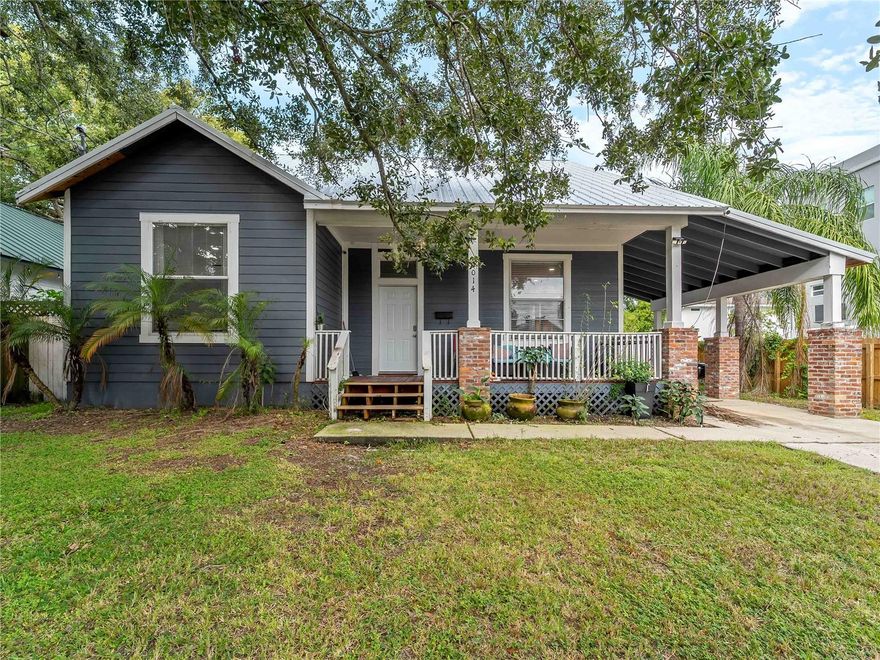 Welcome to 3014 N Tampa Street, gracefully set in the heart of Tampa Heights—one of Tampa’s most coveted HISTORIC neighborhoods, where charming streets and classic architecture meet a vibrant, modern lifestyle.

This BEAUTIFULLY UPDATED, MOVE-IN READY 3-bedroom, 2-bathroom home offers 1,469 square feet of thoughtfully crafted living space, blending the timeless appeal of OLD-WORLD CHARM with the confidence of NEWER CONSTRUCTION. Built in 2000 yet inspired by the elegance of early 1900s design, this home captures the essence of history without sacrificing today’s conveniences.

Step inside to an OPEN-CONCEPT layout highlighted by SOARING CEILINGS and ABUNDANT NATURAL LIGHT, creating a warm and inviting atmosphere perfect for both everyday living and ENTERTAINING. The heart of the home is the stunning kitchen, complete with NEW CABINETRY, QUARTZ COUNTERTOPS, STAINLESS STEEL APPLIANCES, and durable LUXURY VINYL FLOORING that flows seamlessly throughout the main living areas.

Both bathrooms have been TASTEFULLY RENOVATED with CONTEMPORARY TILE, UPDATED VANITIES, MODERN FIXTURES, and ELEVATED LIGHTING, delivering a clean, polished, and FUNCTIONAL DESIGN.

Step outside to a FULLY FENCED backyard—your own PRIVATE RETREAT—offering plenty of space to unwind, entertain, or create your dream outdoor oasis with ROOM FOR A POOL, all while maintaining LOW MAINTENANCE living.

Enjoy an UNBEATABLE LOCATION just minutes from DOWNTOWN TAMPA, with easy access to I-275 and I-4, and close proximity to Ybor City and Channelside. TAMPA INTERNATIONAL AIRPORT and MACDILL AIR FORCE BASE are also conveniently nearby, along with an array of local dining, parks, and entertainment options.

This home truly delivers the perfect blend of LOCATION, CHARACTER, and MODERN COMFORT—where historic inspiration meets contemporary living.