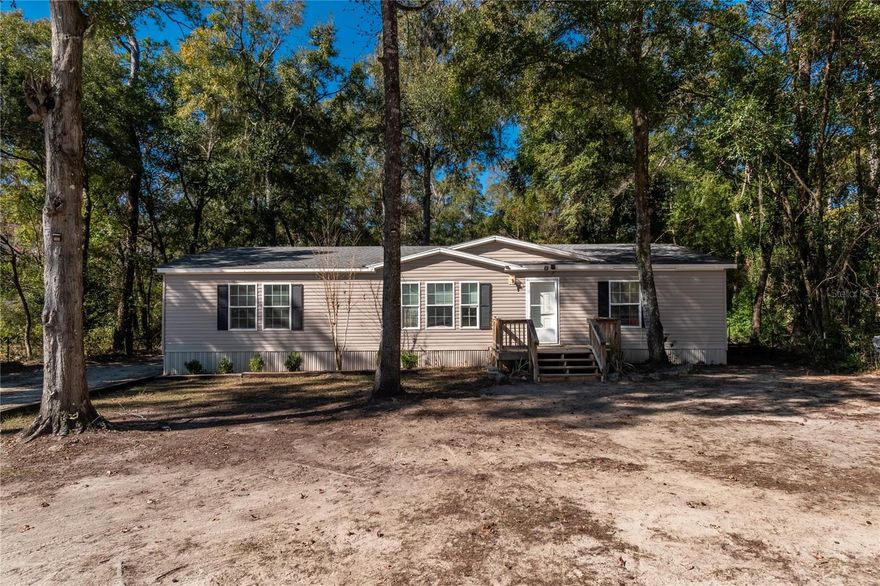 Welcome home! This spacious 3 bedroom, 2 bathroom home is located just outside of Melrose. Minutes from Lake Santa Fe and a short commute to Gainesville or Palatka. This 1800 sqft home has a spacious master bedroom/bathroom and a split floor plan. Fresh paint inside and LVP flooring in the main living areas, ready for you to move right in! Roof and HVAC have both been recently replaced. Outside there is a huge pool and a 30x40 deck on a cleared and fenced almost one acre yard. Scheduled your showing today!