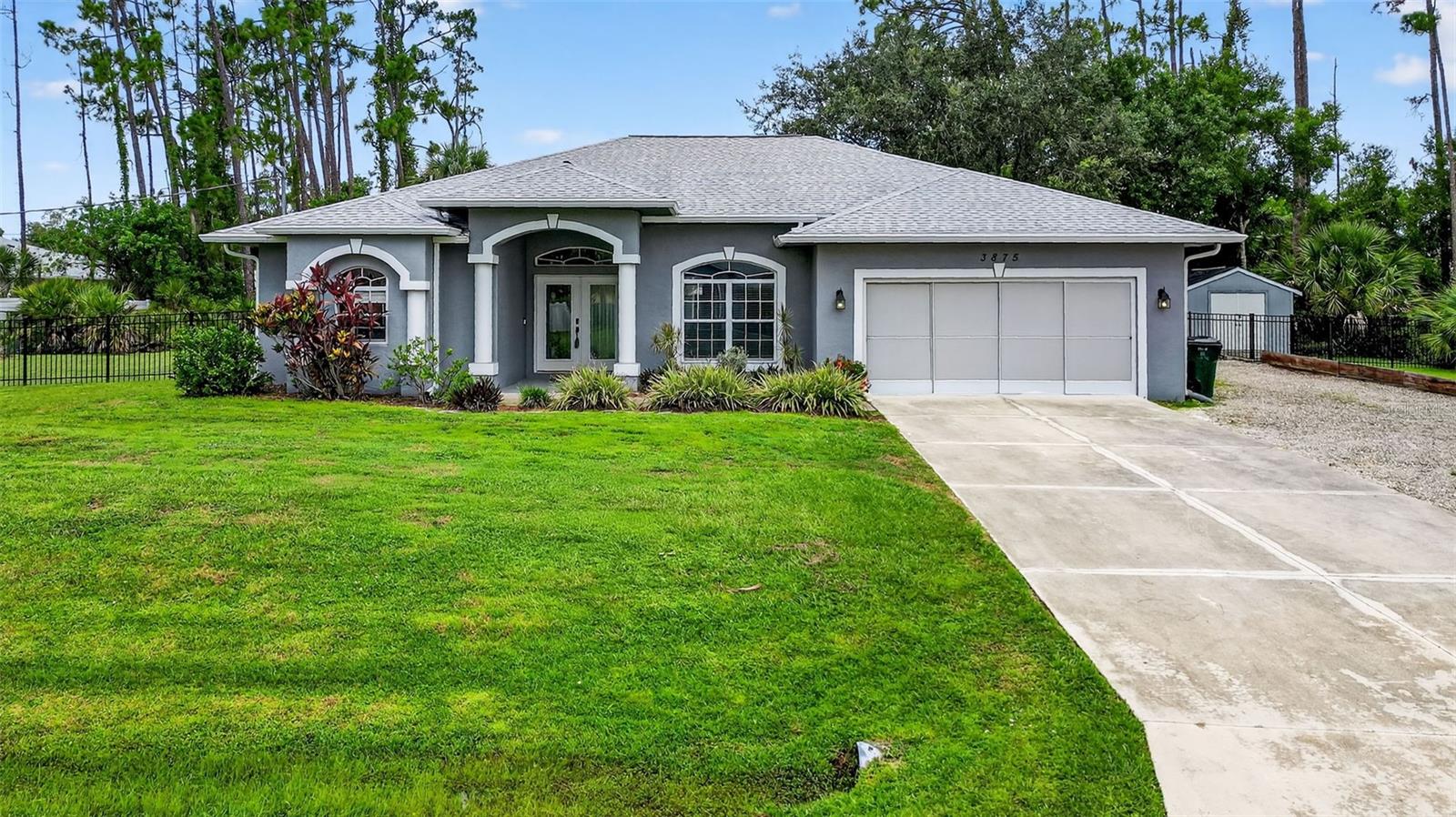 One or more photo(s) has been virtually staged. A RARE FINE in desirable North Port! Surround yourself in this well maintained, spacious, quality Windermere built pool home on an oversized double lot. Florida living at its best. Submerse in peace and tranquility as your relax by your screen enclosed heated inground pool and spa surrounded by an oversized private yard. The gorgeous fenced-in yard will keep your pets safe. Additional must have features include: RV/Boat pad for big toys, 2 sheds for extra storage, leaf guard gutter system, back-up generator connection, and an air conditioned carpeted garage with on/off damper switch and sliding screens for the perfect get-away-space. Come experience the peace and serenity as soon as you walk-in and view the sparkling pool, covered lanai and private yard through the unobscured oversized sliding glass doors. Follow the expansive tile floors connecting the split bedroom floor plan where you can sneak off to your private master bedroom retreat with dual walk-in closets and a roomy en-suite bath featuring dual sinks and walk-in shower. All of the bedrooms are adorned with maintenance easy wood-look plank flooring. Enjoy healthy living with a WHOLE HOUSE REVERSE OSMOSIS (RO) system. The garage is plumbed and ready for a utility sink. Newer roof (2021). Hot water heater (2019). All faucets were replaced (2019). Air condition system (2016). New septic tank (2020). Close to and within 1/2 mile to the Suncoast Technology College, 3/4 mile to Interstate 75, 1 1/2 miles to Publix shopping center and less than 17 easy miles to Manasota Key to enjoy Florida beaches, and salt water swimming and fishing in the gulf. No Flood zone, No HOA Fees, No CDD Fees. Just come and enjoy this Florida gem you'll want to call home. Please go to the listing on Homes.com to view the 3D tour. BOM: Not due to inspections or home issues. Out of state buyer decided to go in a different direction.