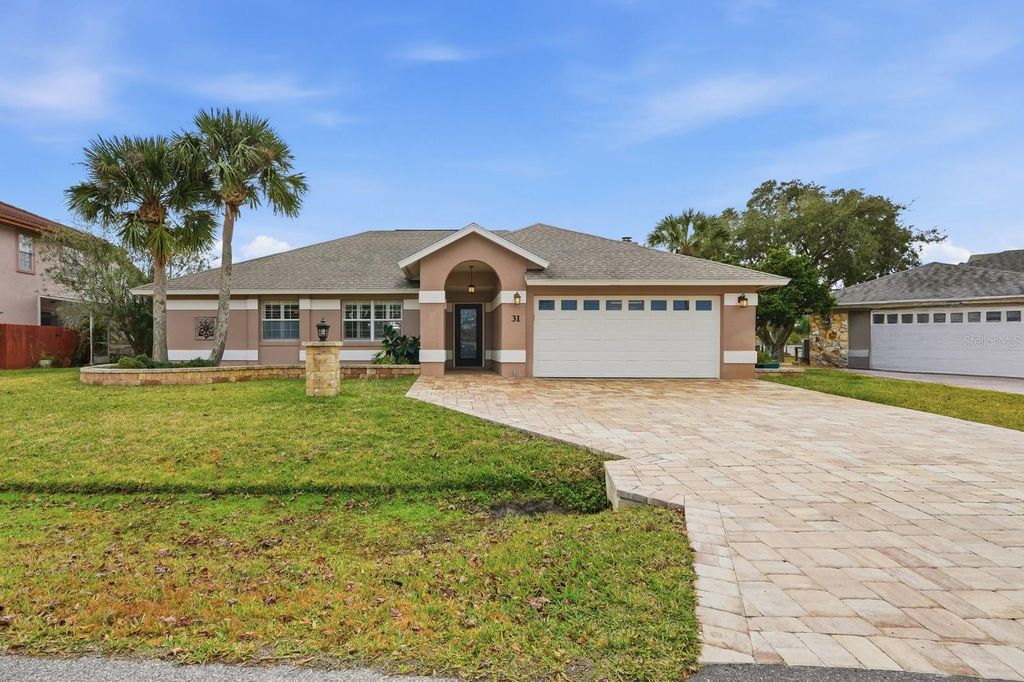 Photo of 31 Cherokee Court W, Palm Coast, FL 32137 (MLS # FC315664)