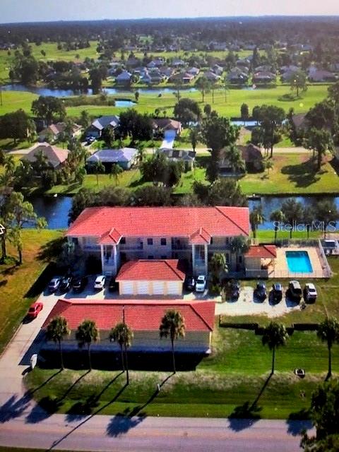 WELCOME TO PARADISE!!! Annual 1328 sqft 2BR/2BA - open concept and updated - rental with 2 oversized one car Garages and is an end unit that overlooks both the waterway and large heated pool. Gasparilla Palms is a beautiful waterfront condo complex on the wide part of the Rotonda Canal. The complex is safe, well-lit at night, and has security cameras. At 1328sqft of living space, the rarely available bottom floor unit (no stairs at all) has the feel of a single family home. The home is a light and bright, large 2 bedroom, 2 FULL bath, with a large and open concept. The large screened in waterfront lanai is wonderful. Enjoy your morning coffee watching the birds, wildlife and the serene water and an evening glass of wine to end the perfect day. The extra-large kitchen has newer stainless-steel appliances, granite countertops, newer ceiling fans, 2 inch faux wood blinds and more. There is a washer and dryer in the unit for your convenience. "Water and trash" are paid for by the landlord. This unit comes with 2 garages and 1 parking space and parking overflow. Outside you'll discover a crystal-clear pool that is "heated" all year round, a nice covered patio and outside restroom for your convenience. It also has a new Weber Propane BBQ grill for residents and their guests to use. Rotonda West is a "lifestyle", it is a hidden jewel and residents quickly and get spoiled with its beauty and charm. For the outdoor lover, Rotonda West has over 30 miles of lakes and canals, beaches, hiking and biking trails, 5 golf courses, world class fishing that are all very close. Englewood Beach and Boca Grande are minutes away. Pets will be allowed on a case-by-case basis. Water included. Call for your private tour.