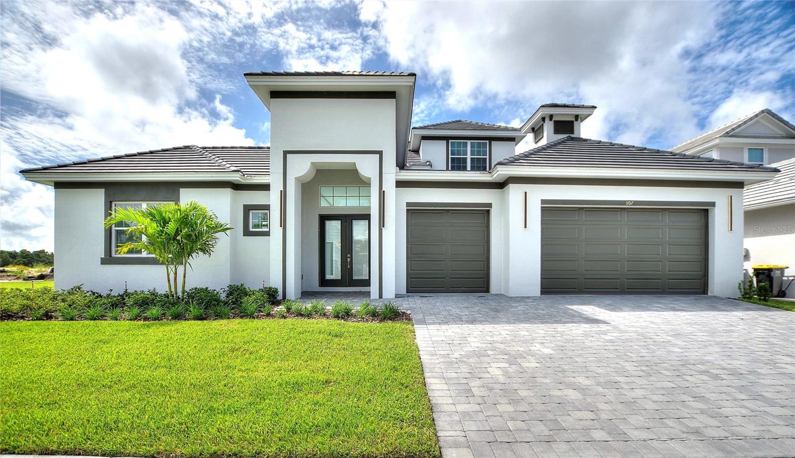 One or more photo(s) has been virtually staged. Stunning Luxury Home in Hampton Landing – Providence’s Premier Gated Golf Community!
Sellers are offering $15,000 for a Rate Buy Down and Closing Cost. Discover refined living in this exceptional corner-lot residence located in Hampton Landing at Providence Golf Community. Perfectly positioned for privacy and panoramic golf course views, this home offers the ideal blend of sophistication, comfort, and functionality.
Step into an open-concept floor plan bathed in natural light, with expansive living areas seamlessly flowing together, perfect for entertaining and everyday living. The gourmet kitchen is a chef’s dream, boasting a large quartz island and stainless steel appliances.
With four spacious bedrooms, three full bathrooms, and a versatile loft space, there’s room for everyone. The laundry room comes fully equipped with a washer and dryer, and an additional area. Enjoy the rarity of the three-car garages.
Your private oasis awaits outside. The custom-designed pool, created for privacy and comfort, and offers a serene retreat. Whether you’re relaxing poolside or hosting guests, this space was made for enjoyment and tranquility.
Located in one of Central Florida’s premier gated communities with resort-style amenities, this home offers luxury, comfort, and an unbeatable view. Call Today and schedule your showing!