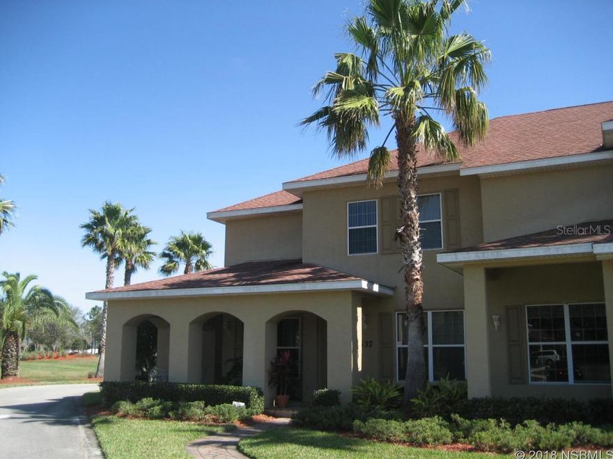 Enjoy a Carefree Lifestyle in a "Maintenance Free" Parkside Townhome in Beautiful Venetian Bay!  This Cambridge Model has  a Fantastic Lake View from your Wrap-Around Front Porch.  An Immaculate & Private End Unit features: 2 Master Suites Upstairs, 2.5 baths and 2 Car Garage, Laundry room with Sink, Window Treatments, Fans, Carpet & Tile. Beautifully Landscaped with Brick Pavers on Porch, Walkway, Driveway and Patio. Venetian Bay is one of New Smyrna Beach's Exclusive Development with an 18-hole Golf Course, Golf Clubhouse, Walk or Bike Nature Preserve & Trails, Restaurant, Day Spa & More! Pet Friendly Too!  (Additional Venetian Bay HOA Master Ass. $800 Annually.)  Offered "AS IS", All information is assumed to be accurate, but not guaranteed. ;Water: City