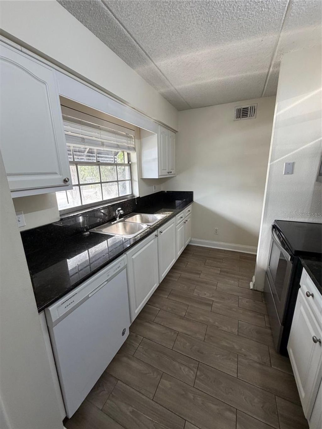 Photo of 120 S Church Avenue #101, Tampa, FL 33609 (MLS # TB8488819)