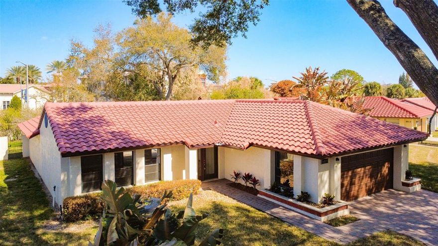 Welcome to your dream pool home! This beautiful 2 Bedroom 2 Bathroom Single Family Pool Home is located in Granada Villas in Dr Phillips and has completely been renovated with New Flooring, New Kitchen, New Bathrooms, New Roof installed in 2025, New Hot Water Heater installed in 2025 and More. Enjoy the Large living room with vaulted ceilings and Travertine Floors, offering plenty of space for entertaining or relaxing. With views of the large front yard and Pool area. Access the amazing backyard from every room. The Backyard features a screened in pool, covered patio and a large fully fenced in Yard.  Fully updated Kitchen with cabinets, appliances and granite countertops. The split-bedroom floor plan offers privacy for the primary bedroom suite and guest bedroom both with updated attached Bathrooms and walk in closets. Granada Villas offers amenities and a location that can’t be beat. The HOA provides individual lawn care including cutting, fertilizing, watering, irrigation system maintenance, landscape trimming & tree pruning. The lakeside gated recreation area features 2 tennis courts, and a boat ramp with access to Little Sand Lake. Only minutes away to restaurants, shops, grocery stores, coffee shops, banks Universal Studios, Sea World and Disney World, International Drive. Easy access to the Orlando International Airport, downtown Orlando.