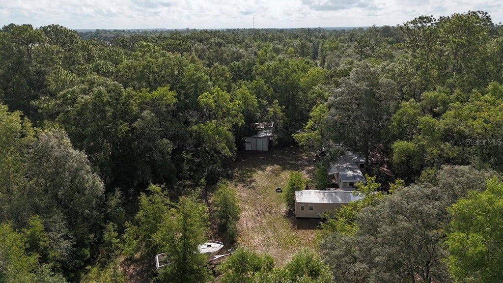 Photo of 9730 NE State Road 24, Archer, FL 32618 (MLS # OM727640)
