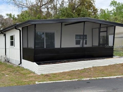 Photo of 9 Plantation Avenue, Debary, FL 32713 (MLS # O6392844)