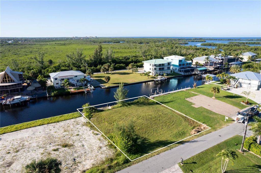 Photo of 24169 Blackbeard Boulevard, Punta Gorda, FL 33955 (MLS # A4668328)