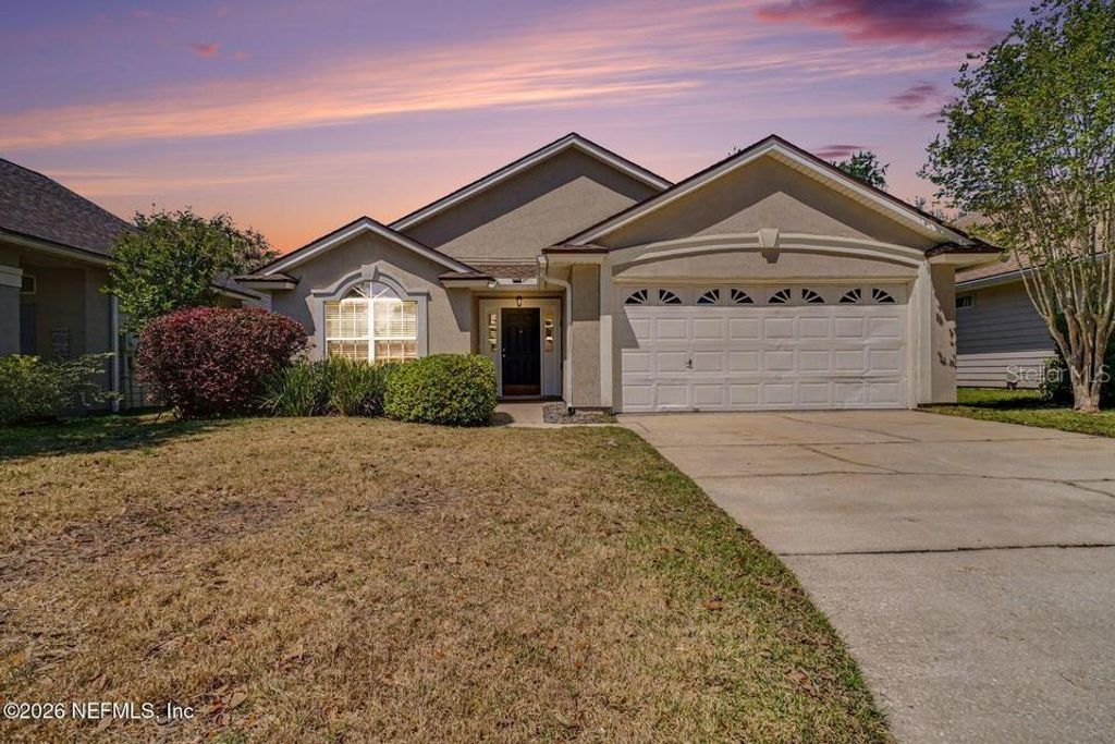Photo of 1719 Rustling Drive, Fleming Island, FL 32003 (MLS # O6399942)