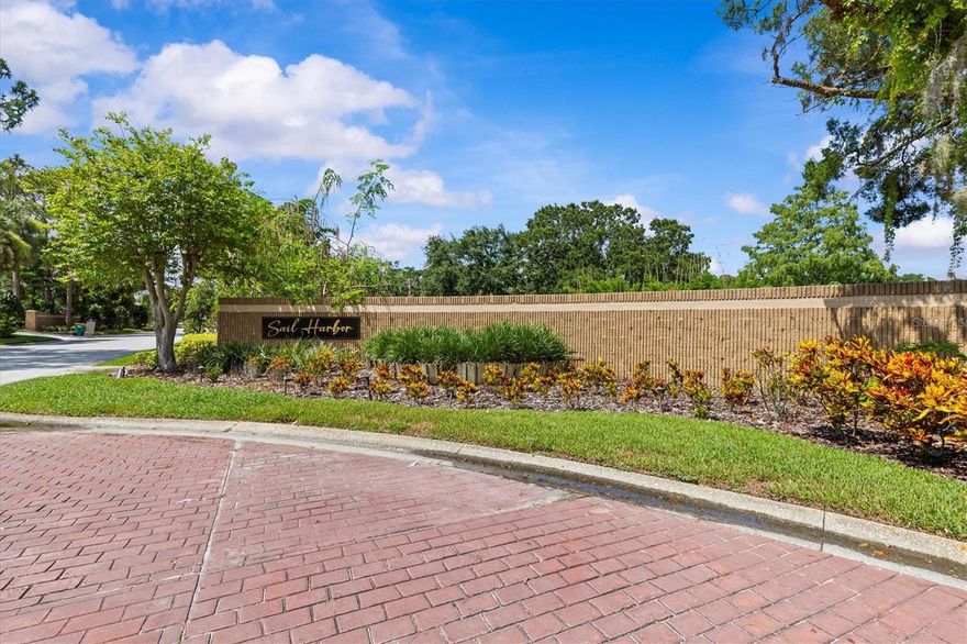 Wow! Beautiful 2 pond views!  If you’ve been searching for a spectacular home at an incredible value, your opportunity has arrived. Welcome to 1520 Jade Lane, located in the exclusive and rarely available community of Sail Harbor. Tucked between the serene banks of the Anclote River, this hidden gem offers direct access to the Gulf of Mexico by boat. The neighborhood includes a public boat ramp, so feel free to bring your vessel and start enjoying the waterfront lifestyle. Surrounded by multimillion-dollar waterfront estates, this property stands out as a true value in an elite setting.
This impressive home spans over 5,000 square feet and is situated on a sprawling 1.11-acre lot with views o 2 ponds. It features a three-car garage, two spacious driveways, and a resort-style swimming pool with rock waterfall ideal for entertaining. The entire home is protected by motorized hurricane shutters that ensure peace of mind. Inside, you’re greeted by soaring vaulted ceilings, an open floor plan, and stunning views of the pool from the moment you enter. The cozy fireplace adds a welcoming touch to the main living space.
The private master suite is located on the upper level and includes its own balcony, a spacious bathroom, a fireplace, and two large walk-in closets. On one wing of the home, you’ll find the family room and a generous kitchen with granite countertops that overlooks both the pool and the living areas, along with a charming breakfast nook. This side of the home also features a bedroom, a full bathroom, and an expansive bar and bonus area—perfect for entertaining or a pool table.
The opposite wing includes several additional bedrooms, another full bathroom, and a massive storage room. At the end of the hallway, a large addition offers an oversized bedroom that could easily serve as a second master suite. This room boasts breathtaking views of the two ponds on the property and offers picturesque sunsets that make it truly special.
 The home comes equipped with a central vacuum system, a durable metal roof installed in 2011 with a limited warranty through 2031, four  A/C units installed in 2013, and a hot water heater added in 2016. Other amenities include fenced in yard for dogs or play area, 2 circular driveways, 3 car garage and parking for boat/RV 
This home had a repaired sinkhole, which occurred due to construction equipment used during an addition in 2001—not due to natural causes. The issue was professionally repaired over a decade ago, and full engineering reports are available for review.
Don’t miss your chance to own this incredible home in one of the area’s most desirable and private communities. Zoned for top-rated Pinellas County schools, Low HOA and a friendly, well-kept community. Located just minutes from the Gulf beaches, historic downtown Tarpon Springs, the famous Sponge Docks, and countless dining, shopping, and recreational options, this home is perfectly situated for Florida living at its best.