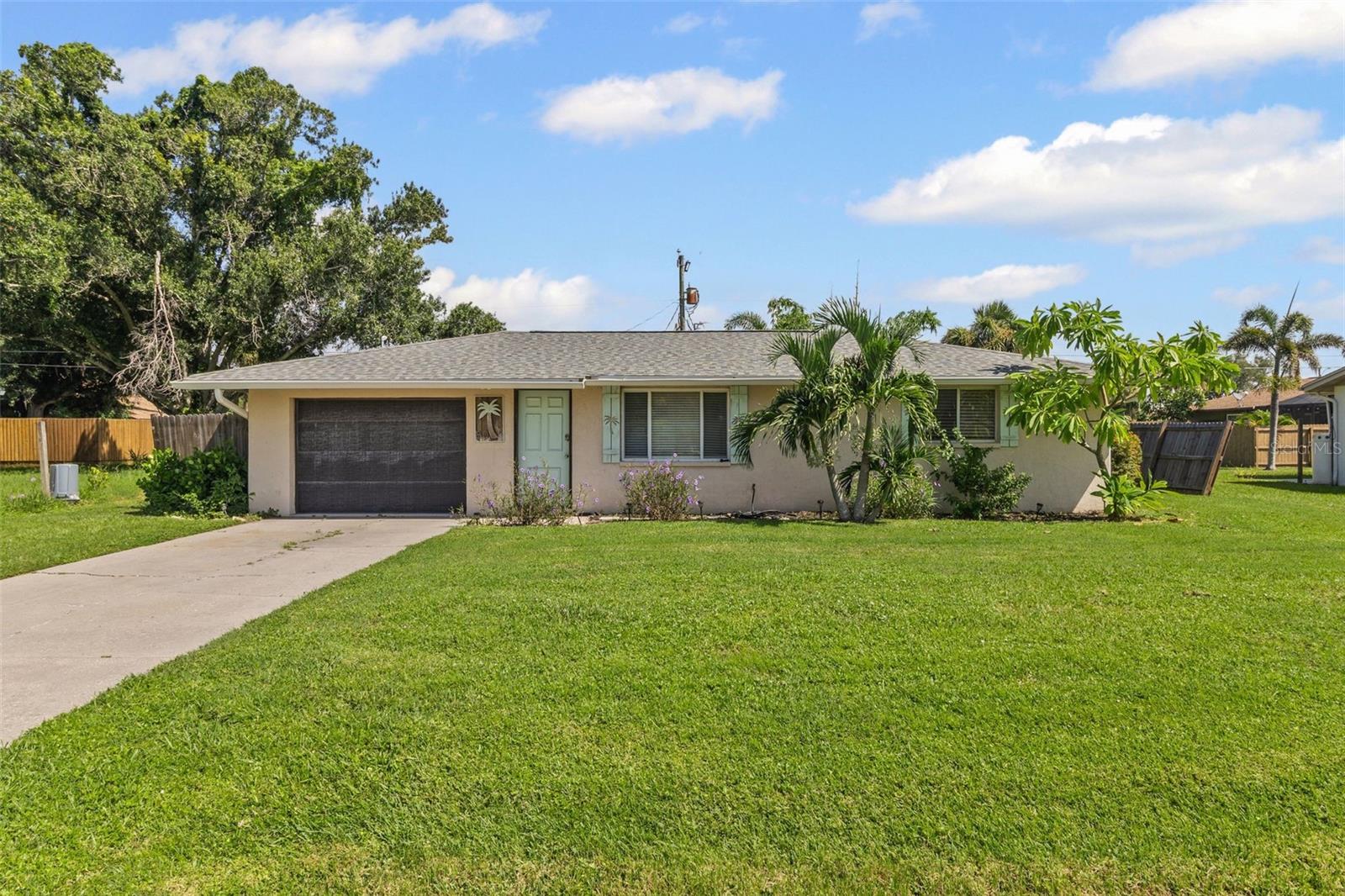 Located just 2.7 miles from the powder white, sandy shores of Manasota Key Beach, this beautifully updated Venice home captures the essence of relaxed coastal living. Nestled on a quiet, non-deed restricted street, the property is within easy reach of all that Venice has to offer—shopping, dining, historic downtown, and more.
Step inside and you’ll find a light, airy interior with a modern design feel. Tasteful finishes and fixtures create a stylish yet comfortable atmosphere throughout. Easy-to-maintain tile flooring runs seamlessly across the main living spaces, while the recently updated gourmet kitchen features newer stainless steel appliances, a striking celadon subway tile backsplash, handsome butcher block counters, and an oversized stainless farmhouse sink. The open-concept layout flows into an enclosed Florida room—currently enjoyed as a bright dining area—that’s perfect for entertaining family and friends.
Practical updates include a water softener and conditioning system, a 2-year-old roof and water heater, new AC in 2023, newer carpets, a new dryer, and a new weathered-look garage door. This home is move-in ready and sure to be a buyer's beloved retreat in the heart of south Venice. Whether you’re searching for an investment property with rental potential, a seasonal snowbird retreat, or a full-time residence, this versatile home offers the ideal blend of style, comfort, and location.