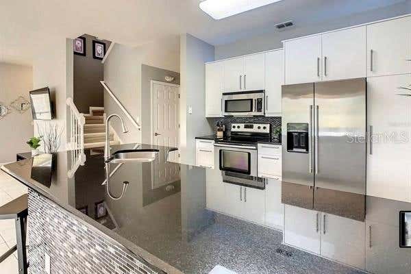 Photo of 3163 Yellow Lantana Lane, Kissimmee, FL 34747 (MLS # O6415064)