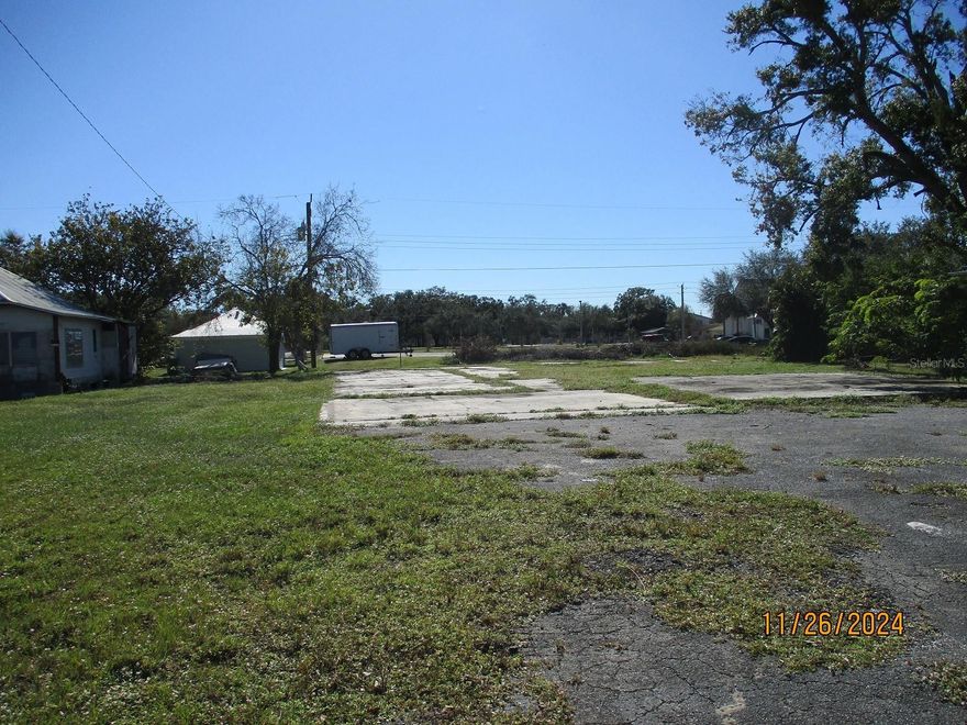 VACANT COMMERCIAL LOT- Vacant commercial lot located in the center of Okeechobee on SW 3rd Street. This vacant lot is next to an office building that is listed separately. Call for more information. All measurements are approximate must measure for exact dimensions.