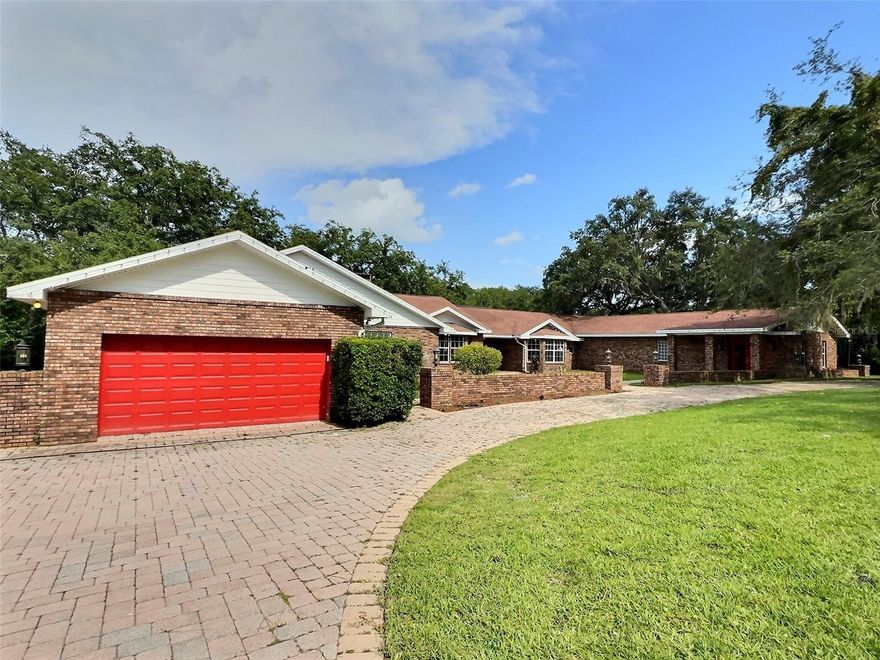Motivated Seller! Welcome to this beautiful WATERFRONT 5 Bed/ 3Bath Home with BRAND NEW ROOF and at 1.26 Acre Lot on Sweatwater Creek. With close to 6500 square footage, this house provide spacious and comfortable living space. House also features separate dining room, extra office/flex room, and upstair loft. Car garage can fit in around 6 cars and Circular paver driveway provide plenty of space for parking and easy access to the main road. This house features a lot of luxury custom designs, especially in kitchen and ding areas. The state-of-the-art kitchen has been completely remodeled with all new custom cabinets and fully equipped with all Viking, high-end stainless-steel appliances, including a professional 6 burner gas cook top with double ovens, a professional series hood, an additional wall oven, 2 dishwashers, a wine refrigerator, microwave and two sub-zero refrigerators. Dining room that overlook the screen swimming pool and backyard is stunning with all custom cabinets and solid stone counter table. Dive in the extra long swimming pool and relax and cool with friend and family in summer heat or spend quality time at the spacious outdoor living area with peaceful water views of the natural creek and landscaping. This breathtaking home is nested in sought-after Sweetwater Community that has access to a community dock, playground, tennis courts and beautiful Lake Brantley. Make this beautiful home yours. Schedule a private showing today and make this beautiful home your new residence... Matterport 3D tour are available on Zillow and MLS for virtual tour and provide room measurements.