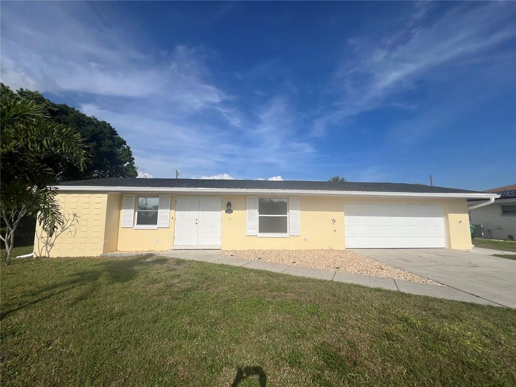 Photo of 249 Seminole Boulevard NW, Port Charlotte, FL 33952 (MLS # C7525419)
