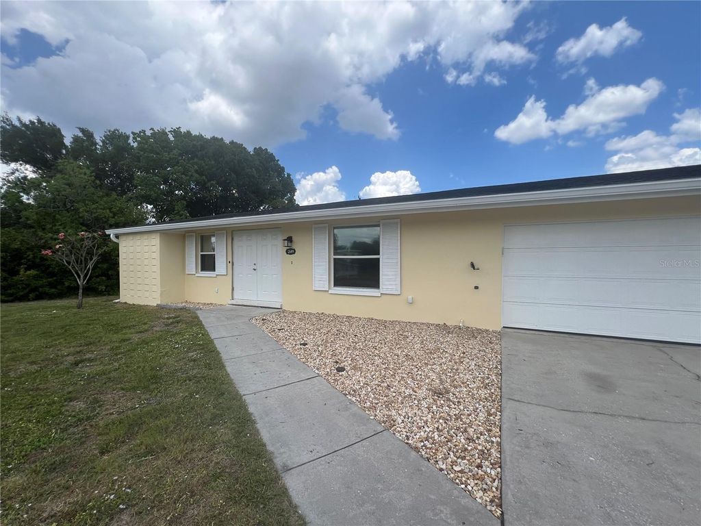 Photo of 249 Seminole Boulevard NW, Port Charlotte, FL 33952 (MLS # C7525419)