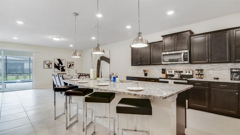 Photo of 3005 Mahalo Drive, Davenport, FL 33897 (MLS # O6353705)