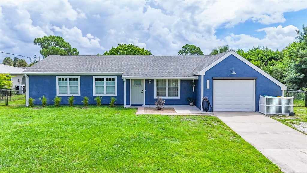 Photo of 2016 Pellam Boulevard, Port Charlotte, FL 33948 (MLS # C7529531)