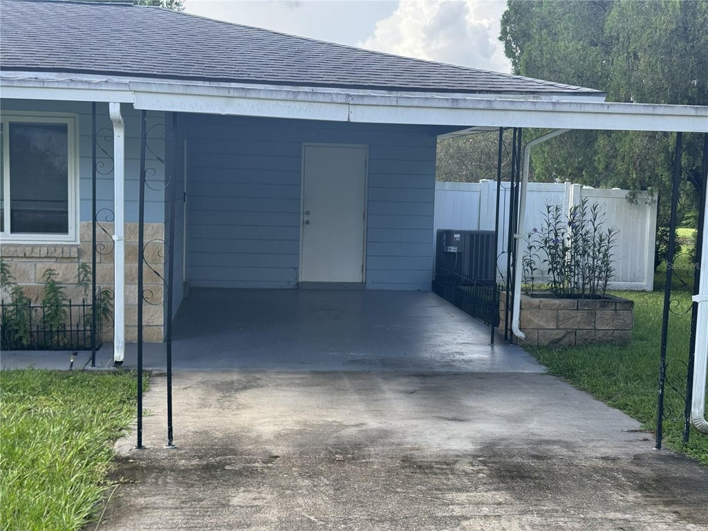 Photo of 21570 SW Raintree Street, Dunnellon, FL 34431 (MLS # OM732215)