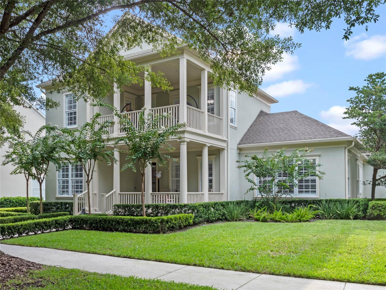 Comfort meets elegance in this spacious 4-bedroom, 3.5-bathroom, 3-car garage Artisan Park home situated on an oversized, professionally landscaped lot. New roof in 2025. Extensively upgraded in 2018 this home is a must see. Notable features in the home include spacious first floor master, high-end hickory wood floors throughout, staircase rebuilt in 2018, premium hardware and hinges on all interior doors, interior and exterior ceiling fans, crown molding on the first & second floors, 7-inch baseboards, high ceilings, high end custom plantation shutters including all exterior doors, stainless steel kitchen appliances, professionally painted (white) cherry cabinets in kitchen and bathrooms (with under-lighting in kitchen), stone backsplash, granite counter tops, custom closets, premium A/C units - 2018 (with 16 seer, UV lights, and humidity control), remote control blind in window at staircase landing, all bathrooms upgraded with new fixtures and hardware in 2018, and air conditioned garage. Ownership includes exclusive resident access to the Artisan Park Clubhouse with benefits including a fitness center, resort style swimming pool and spa, billiards room, outdoor kitchen, restaurant/bar, plus banquet room. Celebration, FL is a residential community where families can enjoy parks, playgrounds, community pools and expansive nature trails, over 26 miles of walking/biking trails and an abundant venue of entertainment and elegant dining options right in town - they are all yours to luxuriate in from sun up to sun down! The following items do not convey with the sale: Dining Room Chandlier, All bedroom ceiling light fixtures, Kitchen droplights over breakfast bar, kitchen droplights over kitchen table, living room fan, garage refrigerator, garage cabinetry and tool storage, garage wall cabinets.