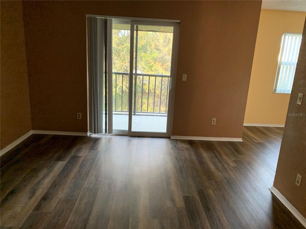 Photo of 2433 Barley Club Drive #8, Orlando, FL 32837 (MLS # O6382049)