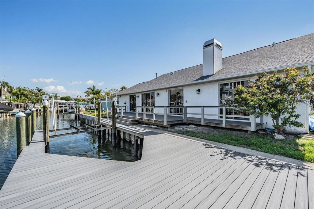 Photo of 2127 Lagoon Drive, Dunedin, FL 34698 (MLS # TB8402530)