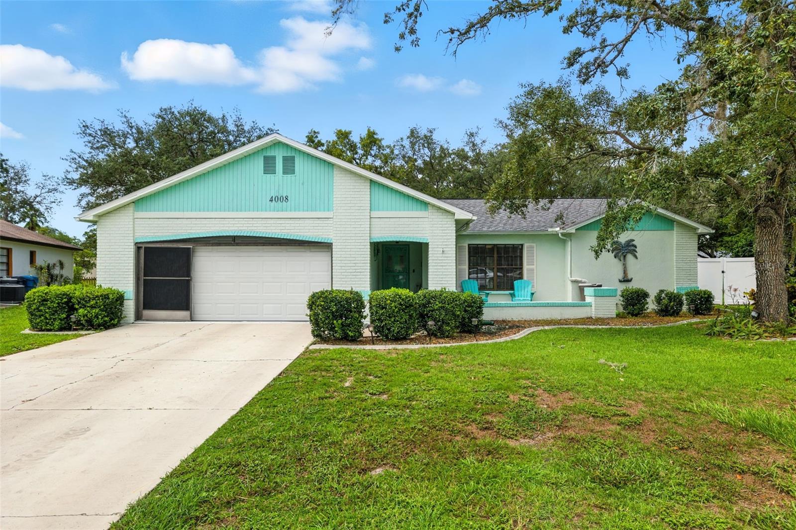 This solid block 3 bedroom, 2.5 bath home has been meticulously maintained and is move-in ready. A brand-new roof installed in 2024 offers lasting peace of mind, while the massive fenced backyard provides plenty of space for pets, gardening, or outdoor activities.
Inside, the home features a spacious layout with a living room, dining room, and a separate family room, giving you multiple areas for relaxing or entertaining. The large screened pool area is perfect for enjoying Florida’s warm weather, complete with a serving window from the kitchen and space for an outdoor kitchen. Sliding doors from the dining room, primary bedroom, and family room make it easy to move between indoor comfort and outdoor fun.
Located on a quiet cul-de-sac, this property is just minutes from the beach, shopping, dining, schools, and parks. With no HOA, no CDD fees, and no flood insurance required, you’ll enjoy both convenience and savings. Extras include a water softener and washer and dryer.