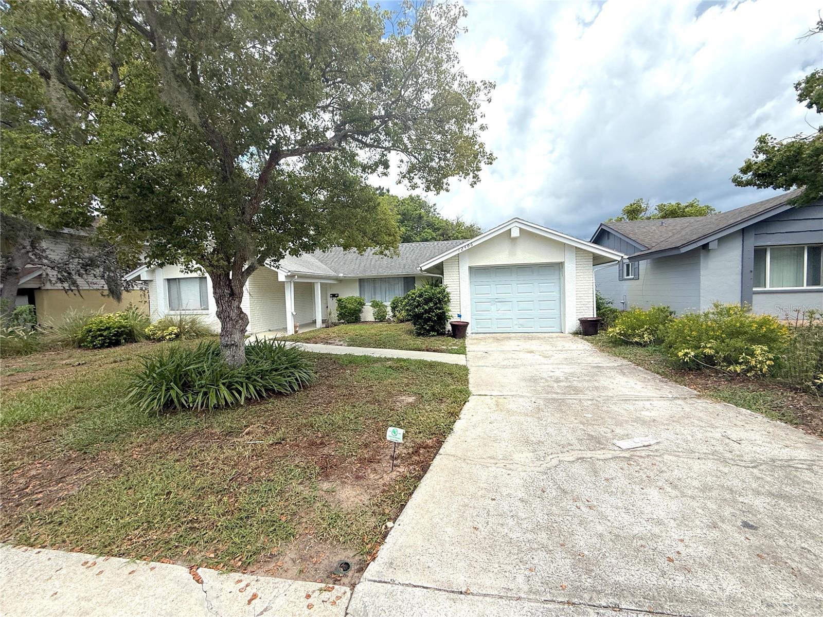 Welcome to this beautifully updated 2-bedroom, 2-bathroom home located in the highly sought-after Beacon Woods community! This vibrant neighborhood offers an array of amenities including an 18-hole golf course, a well-appointed clubhouse, tennis courts, and a sparkling community pool—perfect for an active lifestyle.
As you arrive, you'll immediately notice the mature landscaping that enhances the home's curb appeal. Step inside to discover a bright and spacious open floor plan filled with natural light. The combined living and dining area provides a warm and inviting space for entertaining or relaxing.
Off the dining area, the generously sized primary suite features a walk-in closet and a private en-suite bathroom for your comfort and convenience.
At the heart of the home, you’ll find a well-designed kitchen with updated stainless steel appliances, ample counter space, and a breakfast bar that opens up to the main living area. A charming passthrough window connects the kitchen to the large screened-in porch—perfect for hosting gatherings or simply enjoying your favorite recipes while chatting with guests.
Slide open the glass doors and step out to the expansive screened lanai, where you can unwind with a book, grill dinner, or sip your morning coffee. With over a quarter-acre of land and no rear neighbors, this backyard oasis offers both space and privacy.
Don’t miss your opportunity to own this move-in ready home in one of the area's most desirable communities—schedule your private tour today!