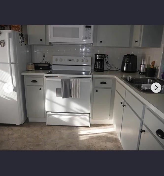 GARDENS OF BEACON SQUARE CONDO - Residential Lease