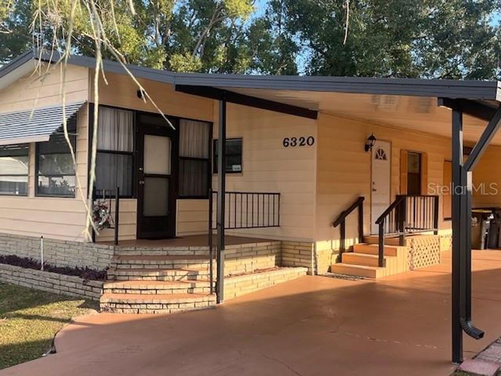 Photo of 6320 Grove Pointe Drive SE, Winter Haven, FL 33884 (MLS # P4937053)